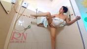 Bokep Terbaru An elegant lady looks at her reflection in the mirror period Babe rubs cosmetic massage lotion oil on her beautiful legs period Shaving legs comma washes her ass and pussy period 3gp